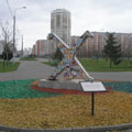 Sculpture - the boy makes the wheel